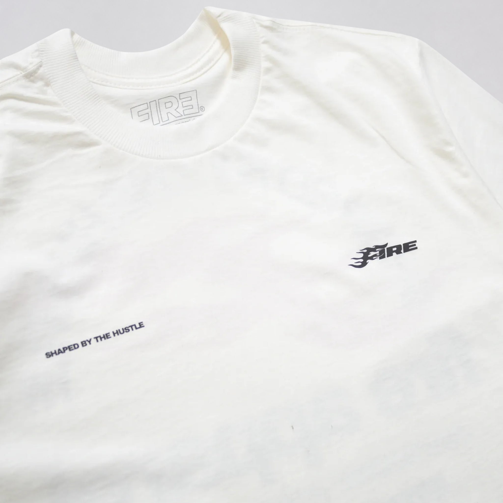 Camiseta Fire Shaped By The Hustle Off White